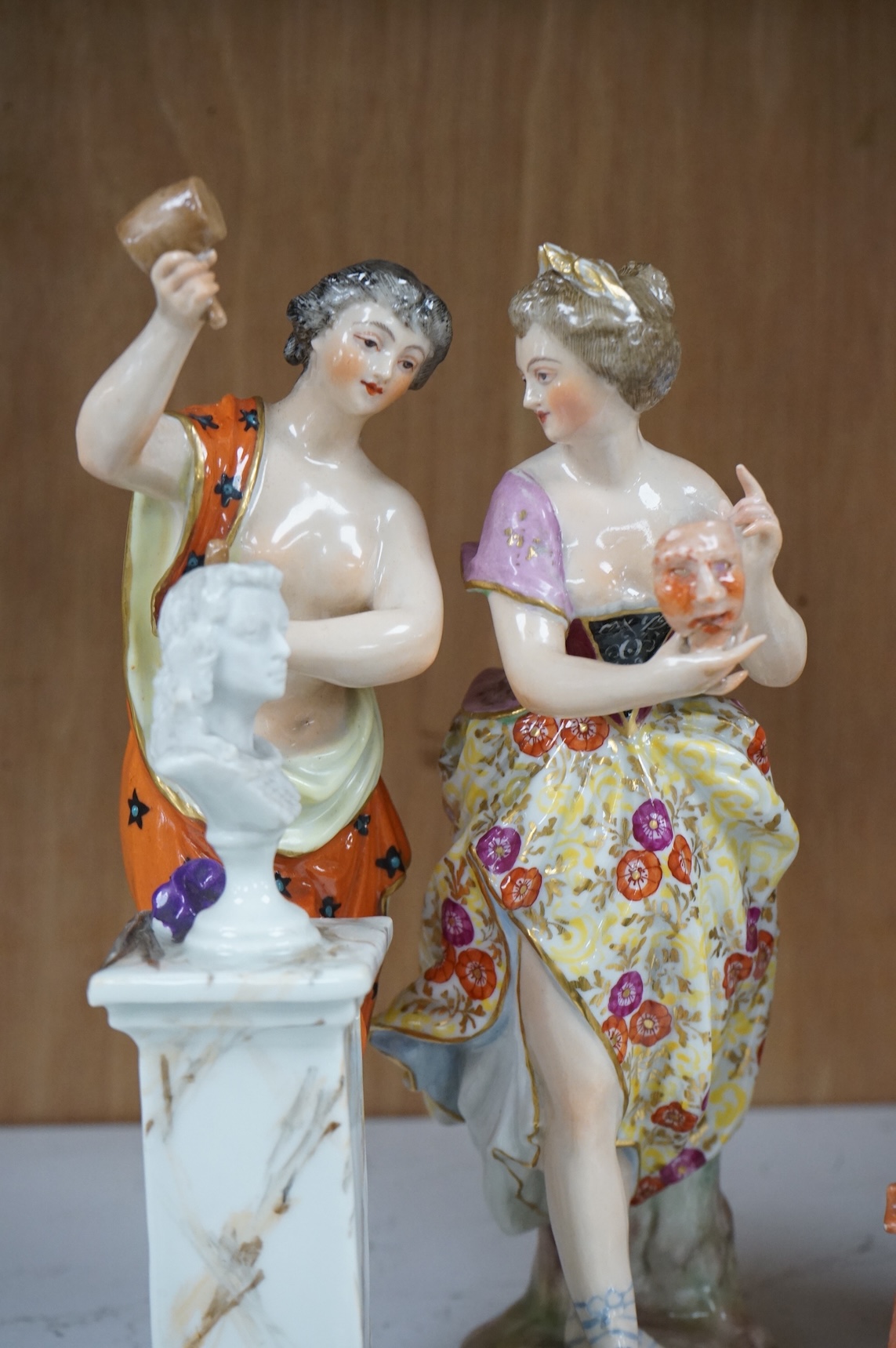 A set of four French Derby style porcelain figures, emblematic of art, sculpture, music and theatre, tallest art 22.5cm high